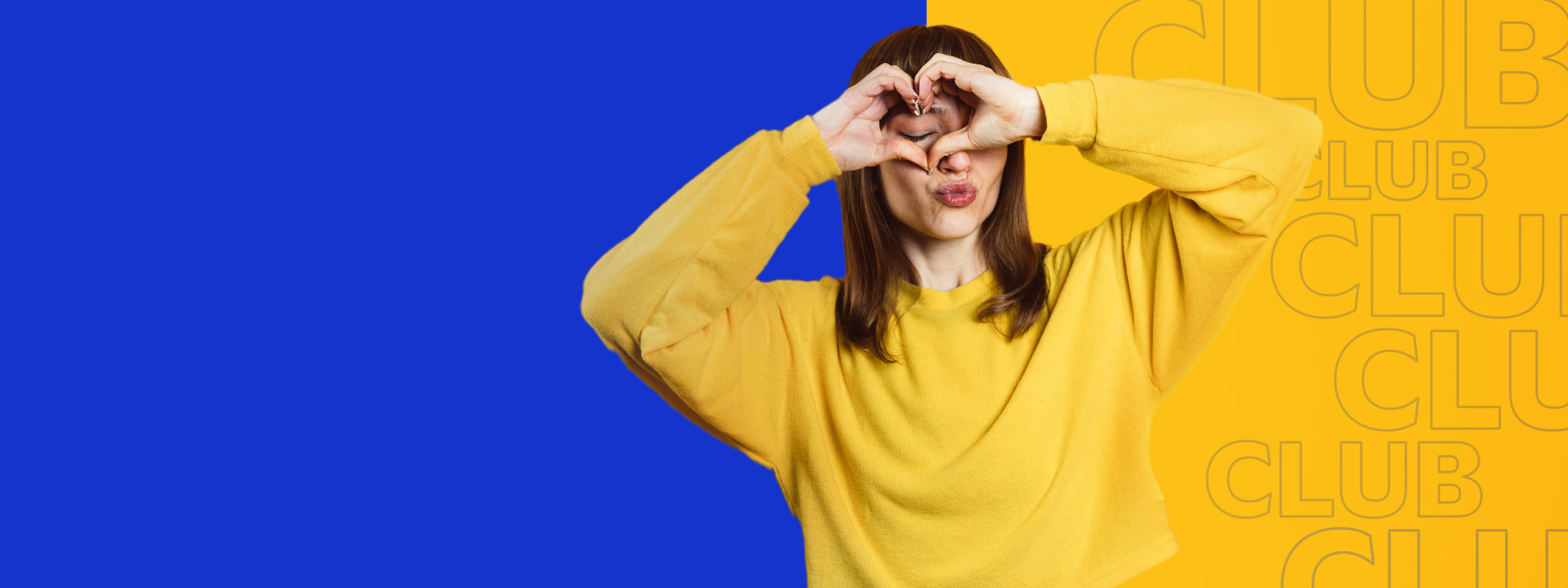 Mujer haciendo un corazón con sus manos